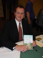 Michael Morris author of -Slow Way Home -where he describes spending pleasant days playing with his cousins on his grandparents farm and trying to forget the past