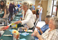 Supervisor Dianne Jacob handing out Popsicles.