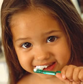 girl washing teeth