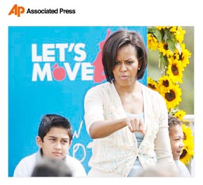 The First Lady Michelle Obama Talking about LET’S MOVE! Campaign, at the left Ruben Abazari. Photo cortesy from Associate Press /Lenny Ignelzi