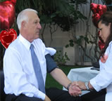 Chairman Supervisor Ron Roberts gets his blood pressured checked as part of the Love Your Heart campaign